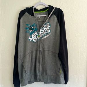 grey and black zip hoodie got it at a sharks game
